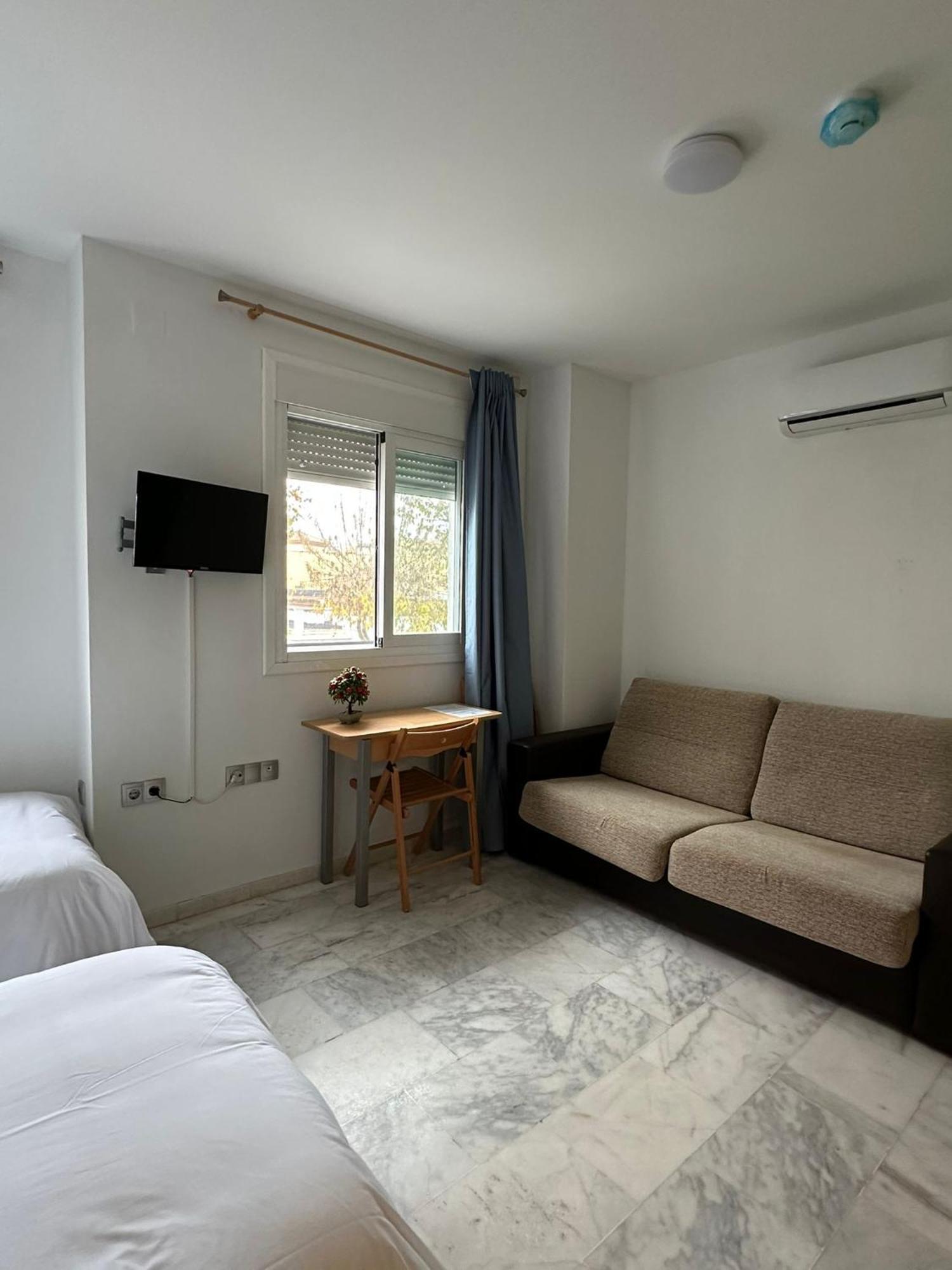 Apartahotel Dona Reyes Чипиона Экстерьер фото